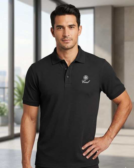 Men wearing a black textured short sleeve polo shirt